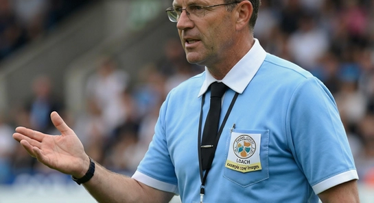 https://example.com/images/referee_coach_1.jpg