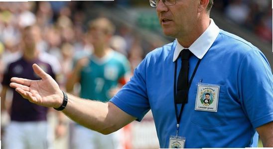 https://example.com/images/referee_coach_2.jpg
